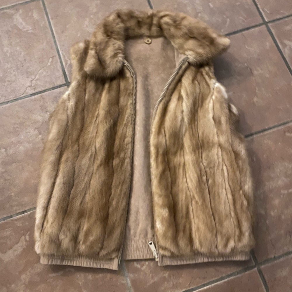 real fur vest, not sure brand but was very expensive
